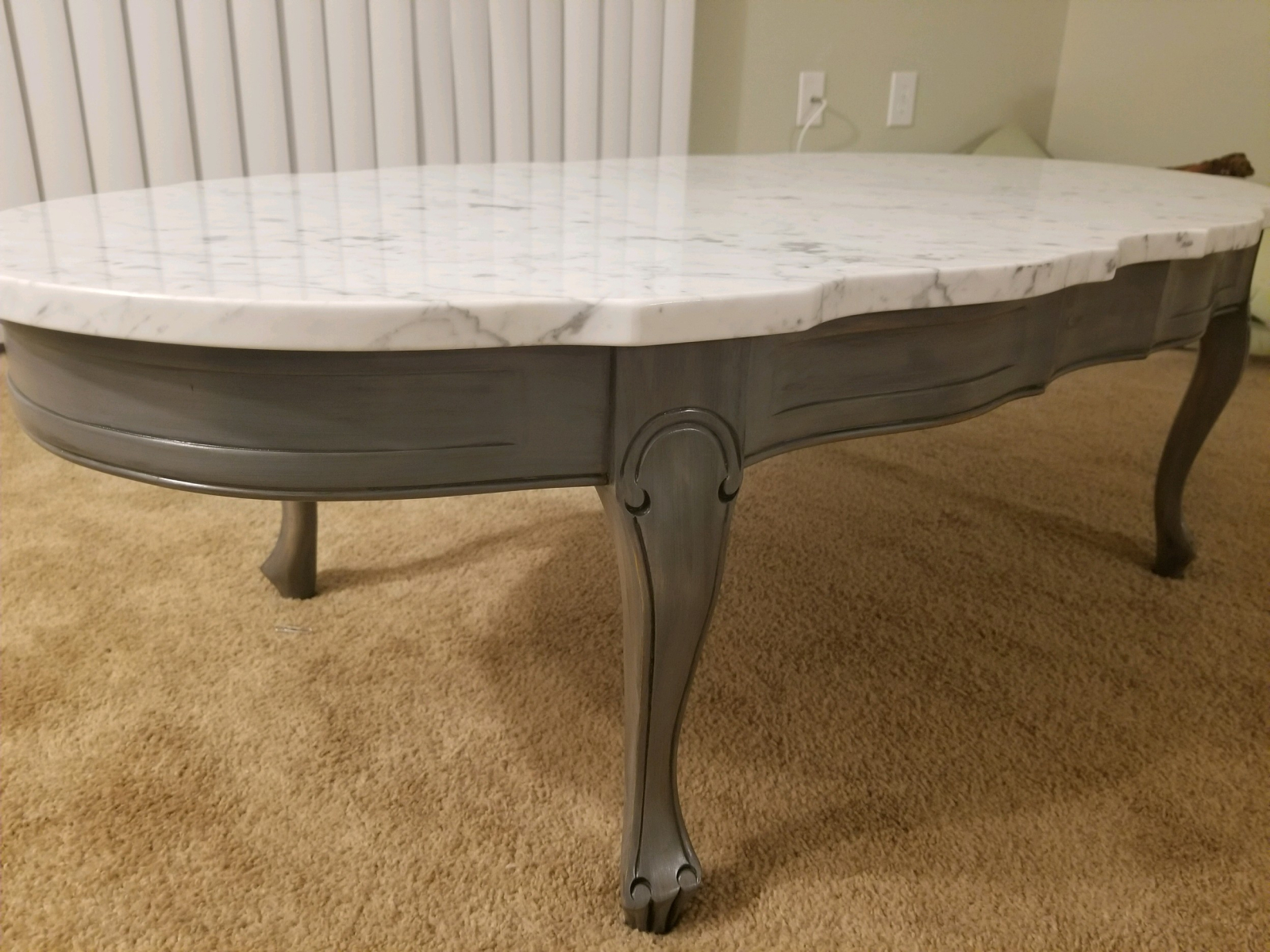 Using wood stain and then glazing showed her beatiful scrollwork