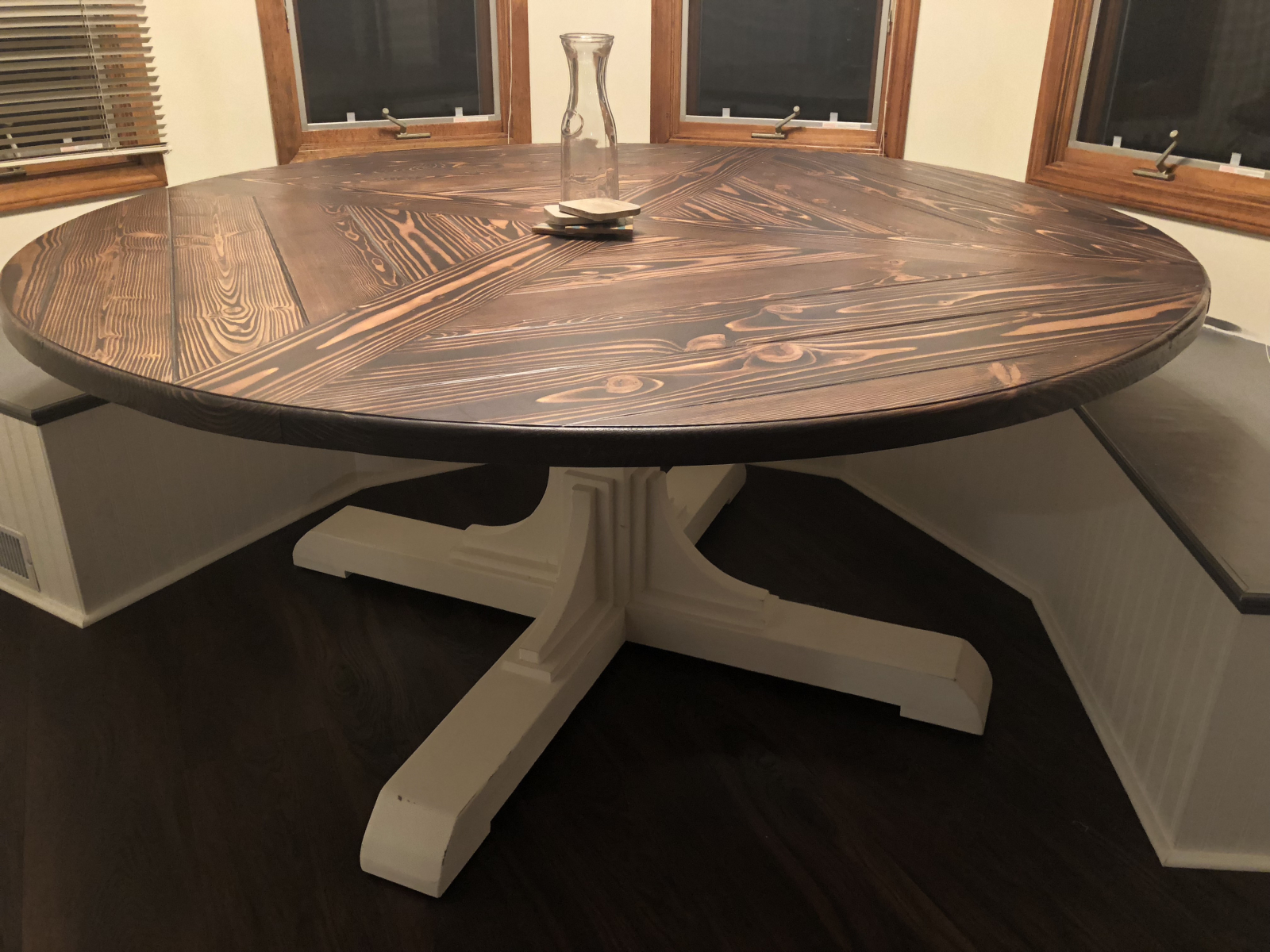 The table and bench make the rest of the remodeling scream for urgency.