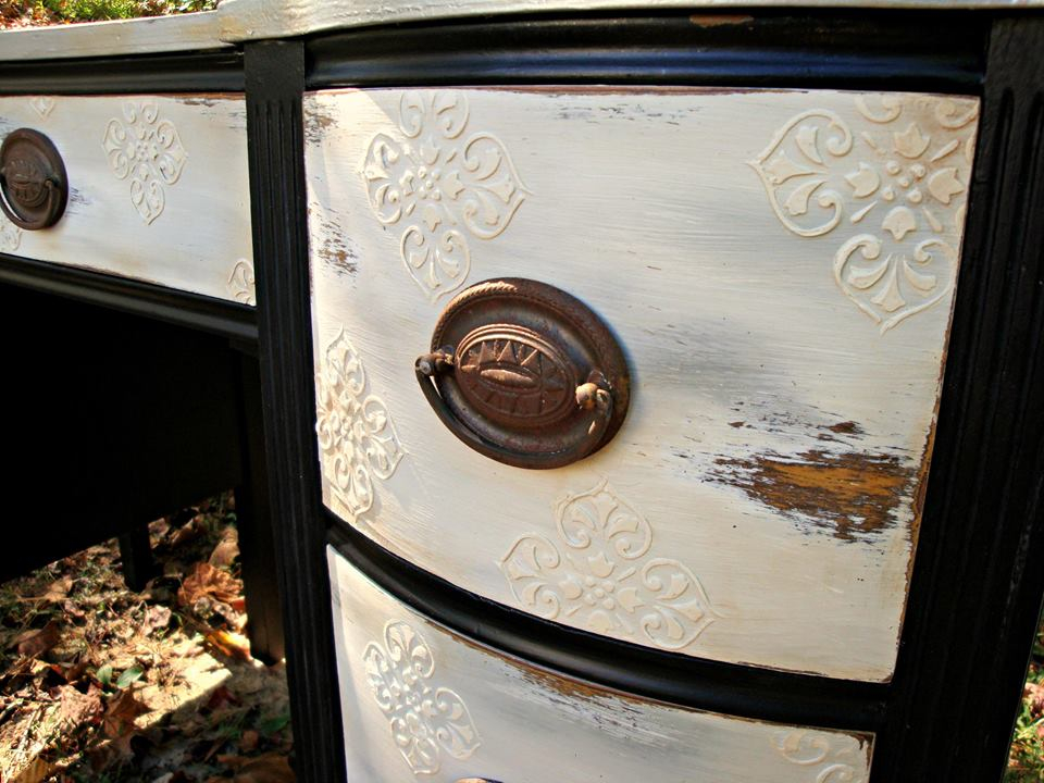 A view of the raised stencils and antiquing