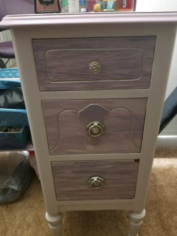 Close up of vanity drawers and knobs with Silver Rub n Buf