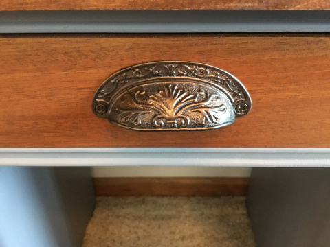Cup pulls highlighted with copper metallic glaze.