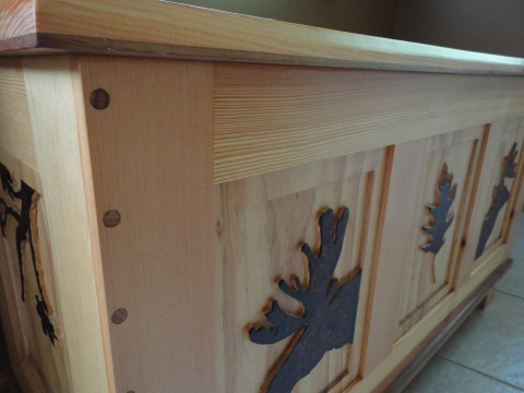 Straight grain and carved panels.