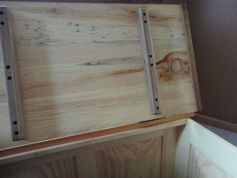 Thick panels with bug ravaged wood.