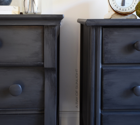 His and Hers mismatched oversized nightstands in deep gray