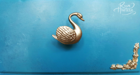 Close Up Swan Handles, Gilded Moulding and Faux Finish