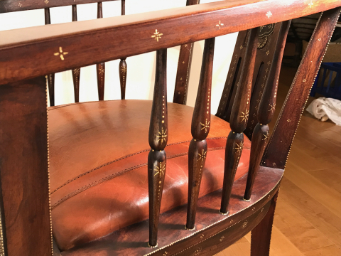 Stained chair, throne. Details