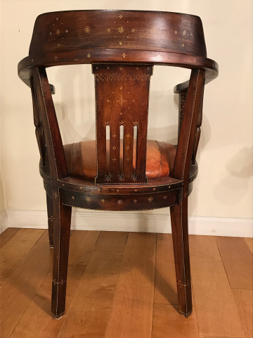 Stained chair. Throne. back